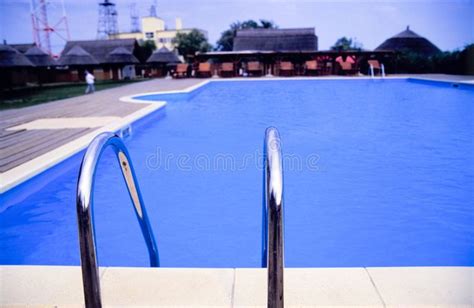 Swimming Pool A Crystal Clear Blue Water In A Luxurious Hotel Swimming