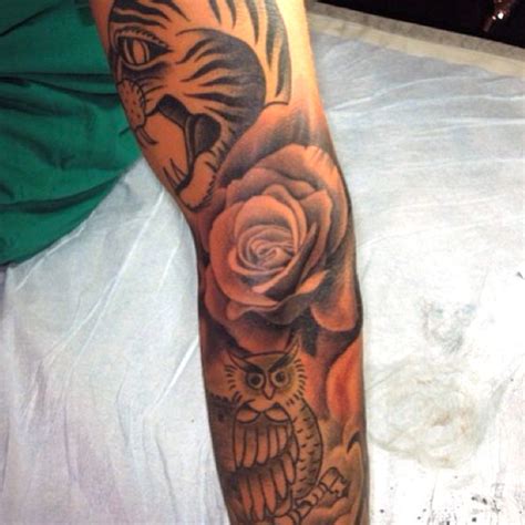 May 26, 2021 · justin bieber and drake's tattoo artist is the skin guru you need to know (illustration by micah fluellen / los angeles times). PHOTO: Justin Bieber gets a rose arm tattoo