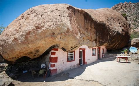 Home Built Beneath A Huge Rock In The Desert Becomes A Tourist Attraction
