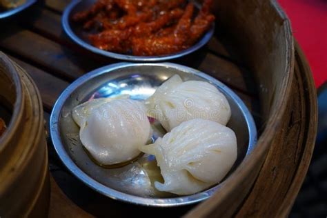 Har Gow Of Hakau Dimsum Served On Tin Bowl On The Wooden Steam Bowl