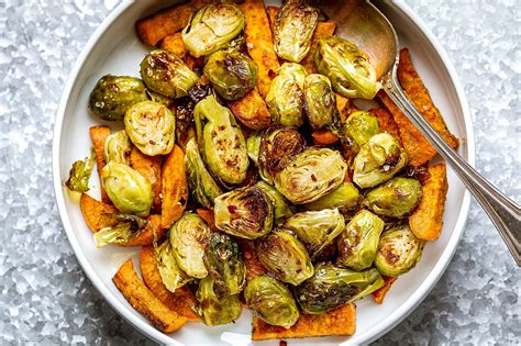 Here's the best way roast brussels sprouts in the oven and a few ways to insure that your brussels get as crispy as possible. Oven-Roasted Brussels Sprouts and Sweet Potatoes Recipe - Baked Brussels Sprouts Sweet Potato ...