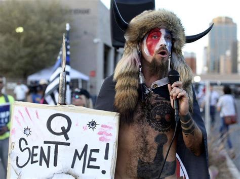 The accused us capitol rioter who calls himself the qanon shaman lied during a jailhouse interview claiming that he was waved into the building by police officers, a federal judge said. 'QAnon Shaman' moved over special diet | Mudgee Guardian ...