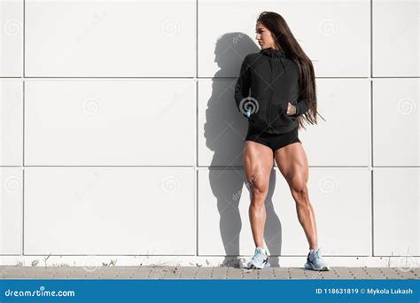Athletic Woman With Big Quads Muscular Girl Posing Outdoor Muscular Legs Stock Image Image
