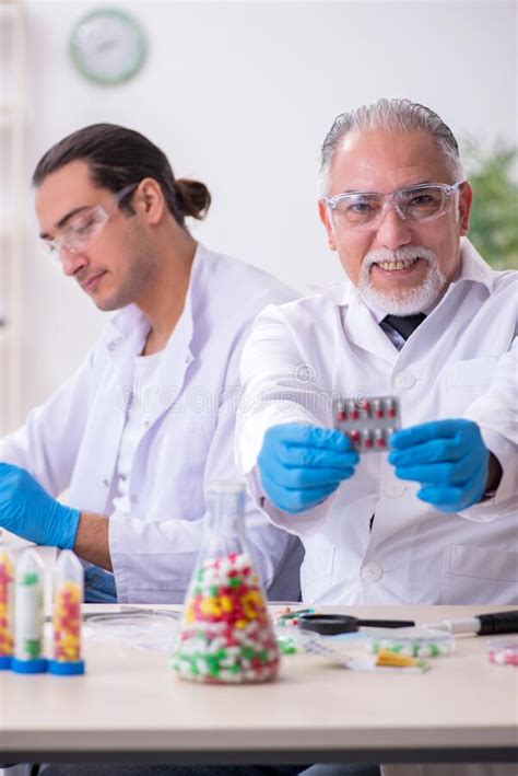 Two Chemists Working In The Lab Stock Photo Image Of Chemical