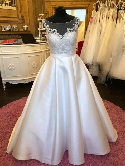 Don't miss out, shop clearance wedding dresses before they're gone! Size 12 Ellis Wedding Dress