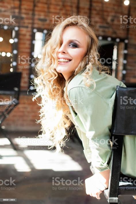 Young Blonde Woman Laughing Female Model With Long Blonde Wavy Hair