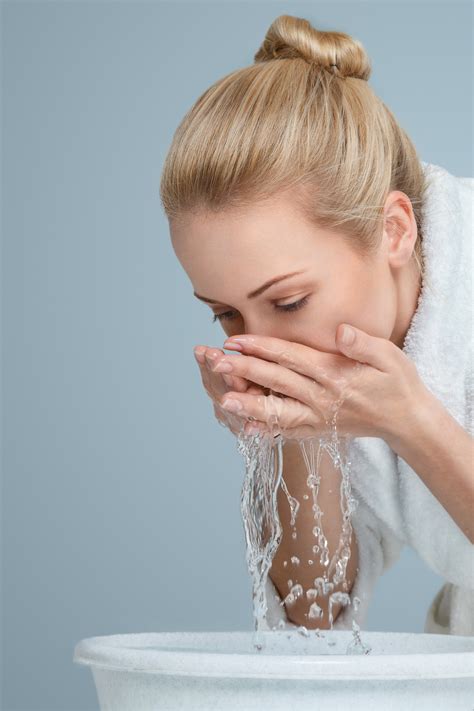 Young Woman Washing Her Face My Non Toxic Tribe