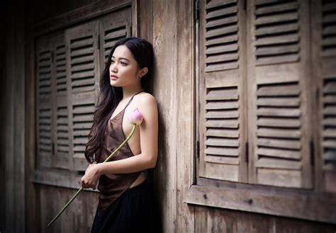 vietnamese beauty women holding lotus photograph by huynh thu pixels