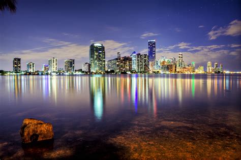 With its endless sunshine, sparkling waterways, lush parks and stunning beaches, miami is a dream for nature lovers. Miami Wallpapers: The City Skyline Across The Beach