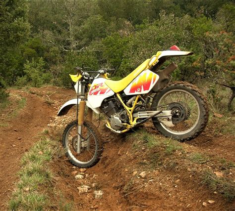 Today calls for a sunny ride on the highway while tomorrow might be a bold departure experience life on a suzuki adventure motorcycle, and you'll soon live for the pull of that torquey. Suzuki DR 350 | Adventure bike, Suzuki, Bike