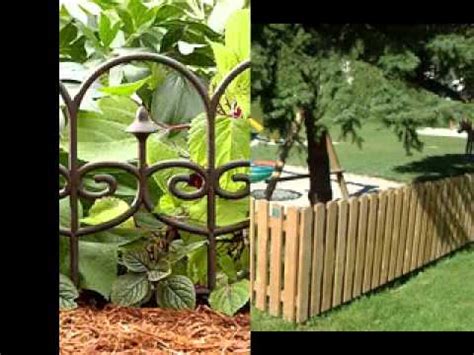 It has wooden posts but the center is constructed of cattle paneling. Small garden fence ideas - YouTube