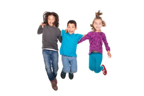 Happy Children Jumping Stock Photo By ©luislouro 111387962