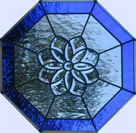 Their symmetric patterns are available in distinctive color schemes as well as colorless glass or antique patina. C20OCT Leaded Glass Window Custom Glass Design
