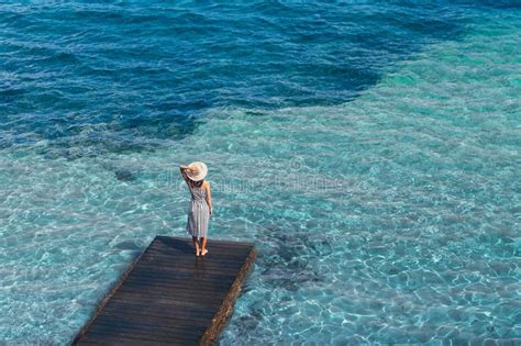 Beautiful Woman Relaxing On Pier In Sardinia Island Italy Stock Image Image Of Alone Freedom
