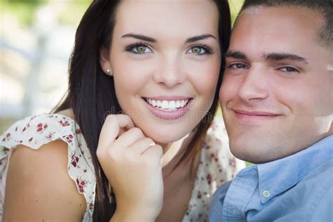 Mixed Race Romantic Couple Portrait In The Park Stock Photo Image Of