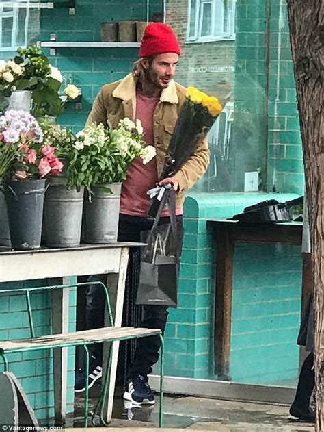 David Beckham Melts Hearts As He Buys Flowers With Harper 6 David