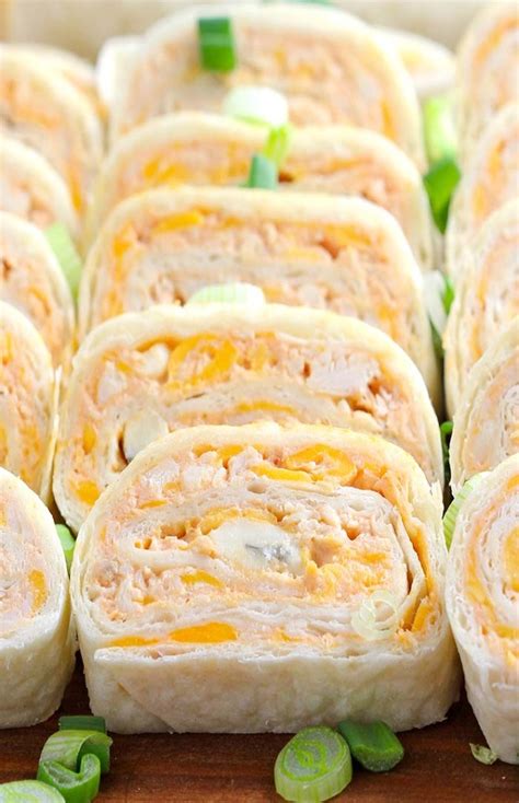 Lay a tortilla out on a plate and spread an even layer of the chicken and cheese mixture all the way to the edges (about 2 to 3 tbsp). Buffalo Chicken Tortilla Roll Ups - Sugar Apron