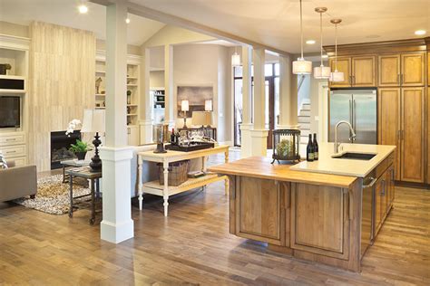 Natural hardwood floors look great no matter how simple the design is. 10 Floor Plans with Great Kitchens | Builder Magazine