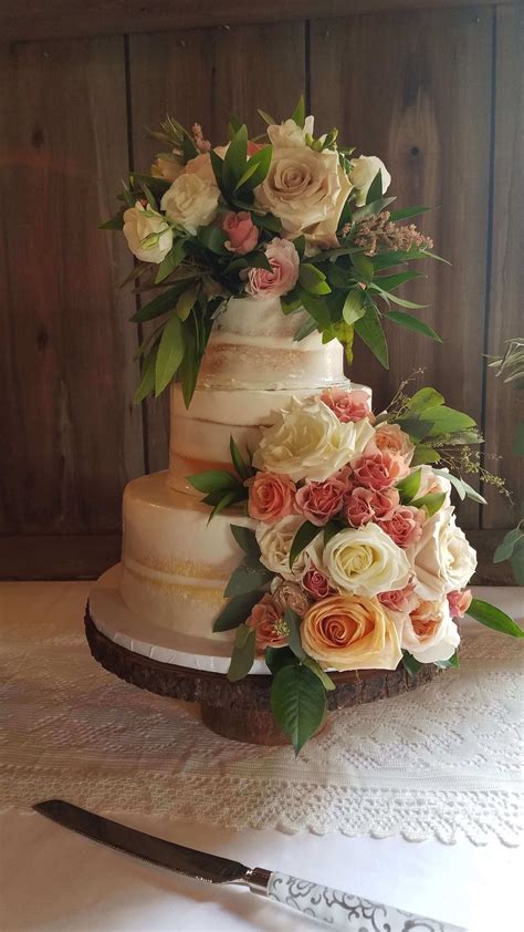 lots of flowers wedding cake wedding cakes minneapolis bakery farmington bakery