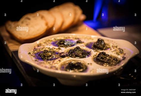 Escargot With French Bread Appetizer Stock Photo Alamy