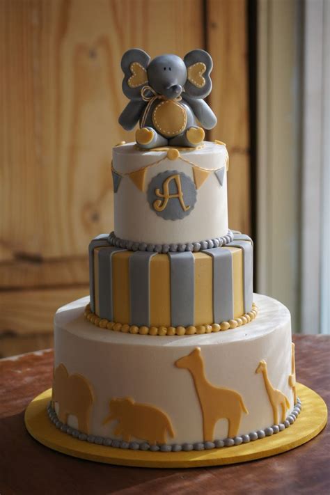 In addition to being gorgeous , it's also totally tasty, with yummy coconut buttercream. Yellow and grey animal themed baby shower cake with ...