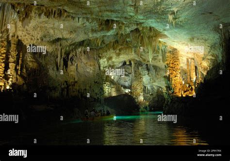 Journalists Take A Boat Tour In The Lower Cave Of The Jeita Grotto