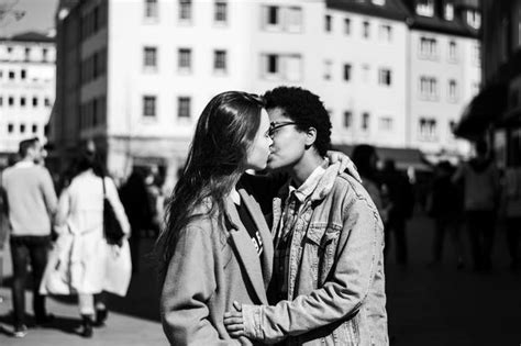 Lesbians Kissing While Standing On City Id 121273874