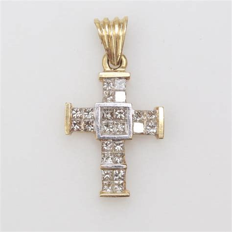 Both symbolic and traditional in design, the cross pendant is perfect for everyday wear. 14kt Gold 1.8g Diamond Cross Pendant | Property Room