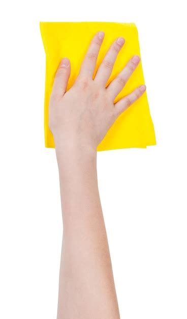 Premium Photo Hand With Yellow Washing Rag Isolated On White