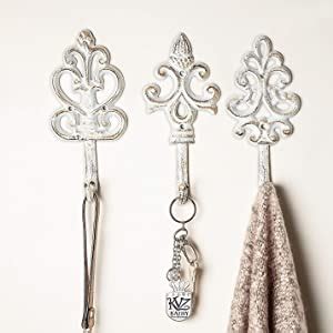 Some of them look more like wall art than anything else! Amazon.com: Shabby Chic Cast Iron Decorative Wall Hooks - Rustic - Antique - French Country ...