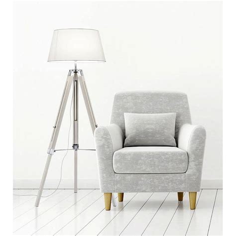 The adjustable alfred tripod floor lamp draws inspiration from vintage hollywood set lights. TRIO Tripod floor lamp white wood