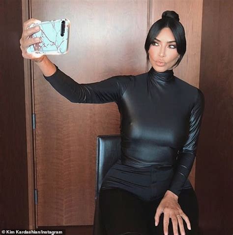 Kim Kardashian Showcases Her Hourglass Curves In Skintight Black