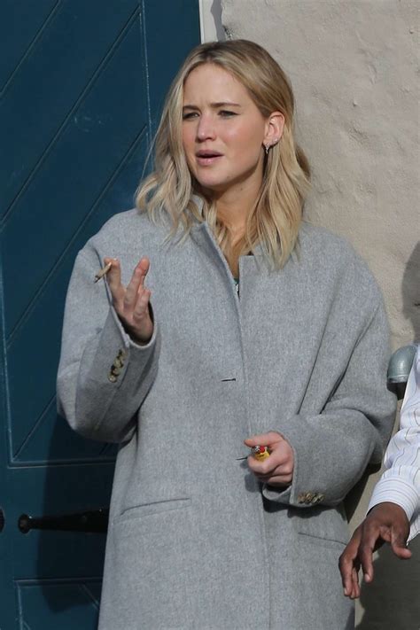 jennifer lawrence in gray coat at peche in new orleans gotceleb