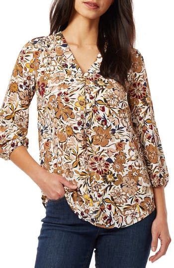 A Pretty Floral Print Brightens A Balloon Sleeve Blouse Fashioned With