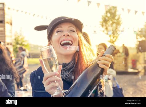 Happy Woman Drinking Wine Having Fun Outdoors Stock Photo Alamy