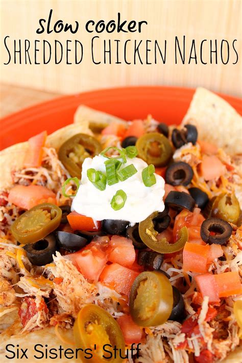 Remove chicken from slow cooker and place on cutting board. Slow Cooker Shredded Chicken Nachos | Six Sisters' Stuff