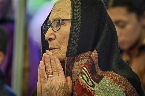 PHOTOS: Worshippers gather after arson damages historic St. Joseph