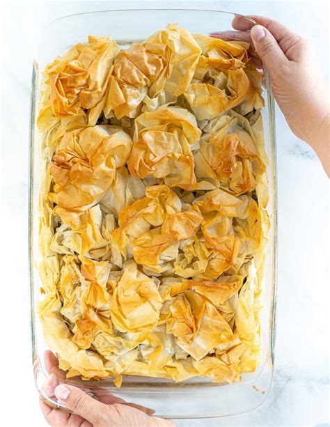 If you make my vegan spanakopitakia, don't forget to tag me on instagram as @lazycatkitchen and use the #lazycatkitchen hashtag. Vegan Spanakopita | FaveHealthyRecipes.com