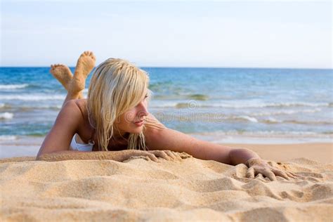 Beautiful Girl Lying On The Sand Stock Image Image Of Rest