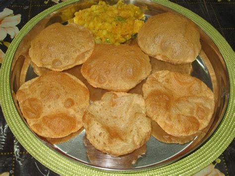 The main food of the tamils is rice along with vegetables and pulses. Tamil Veg Cooking: Poori