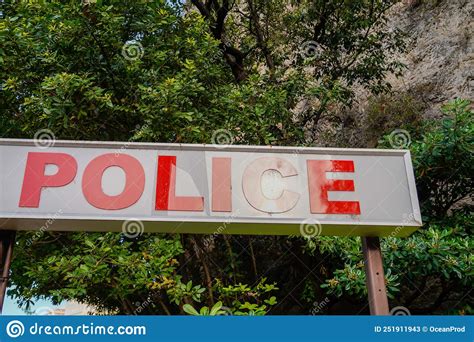 Police Station Red Text Sign In Building City Street Stock Image