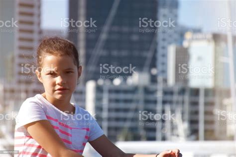 Young Pacific Island Girl In An Urban Scene Stock Photo Download