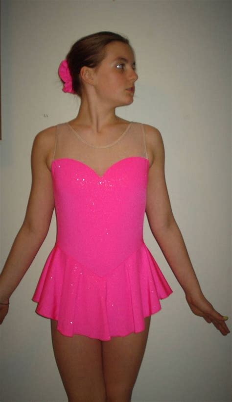 Figure Skating Dress In Pink With A Sprinkle Of Silver And Pink