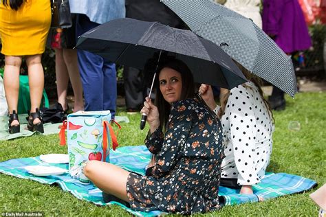 Cox Plate Revellers Seen With Umbrellas Ponchos To Protect From The Rain Express Digest