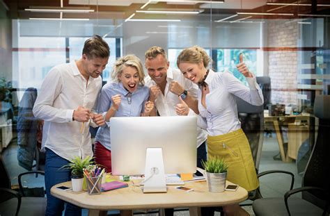 Happy Business Team Celebrate Success At Work Stock Photo Download