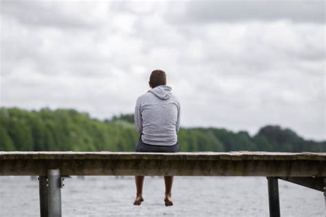 390 Sad Man Sitting By The Lake Stock Photos Pictures And Royalty Free