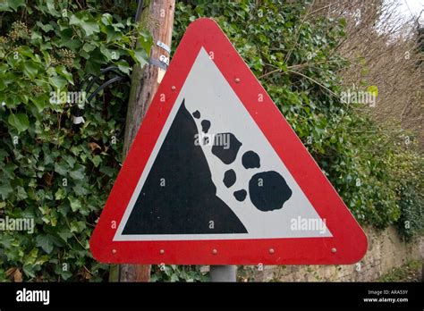 Caution Falling Rocks Road Sign Stock Photo Royalty Free