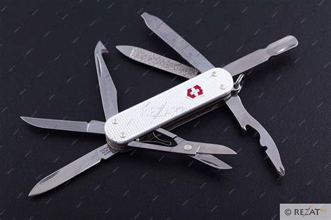Швейцарский складной нож брелок victorinox minichamp alox 14 функций 4 см 0 6381 26 victorinox