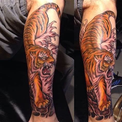Tattoos are often meant to make the wearer look fierce, but the original intention is to reflect the tiger's great power and influence. Japanese Tiger Tattoo - 50 Traditional Design Ideas (2018)