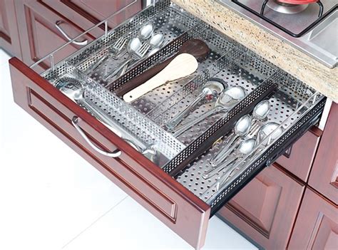 Kitchen cabinet designs play an important role in providing support and a safe storage space for delicate appliances and fragile crockery. Optimise Kitchen Storage With the Right Channel and Basket ...